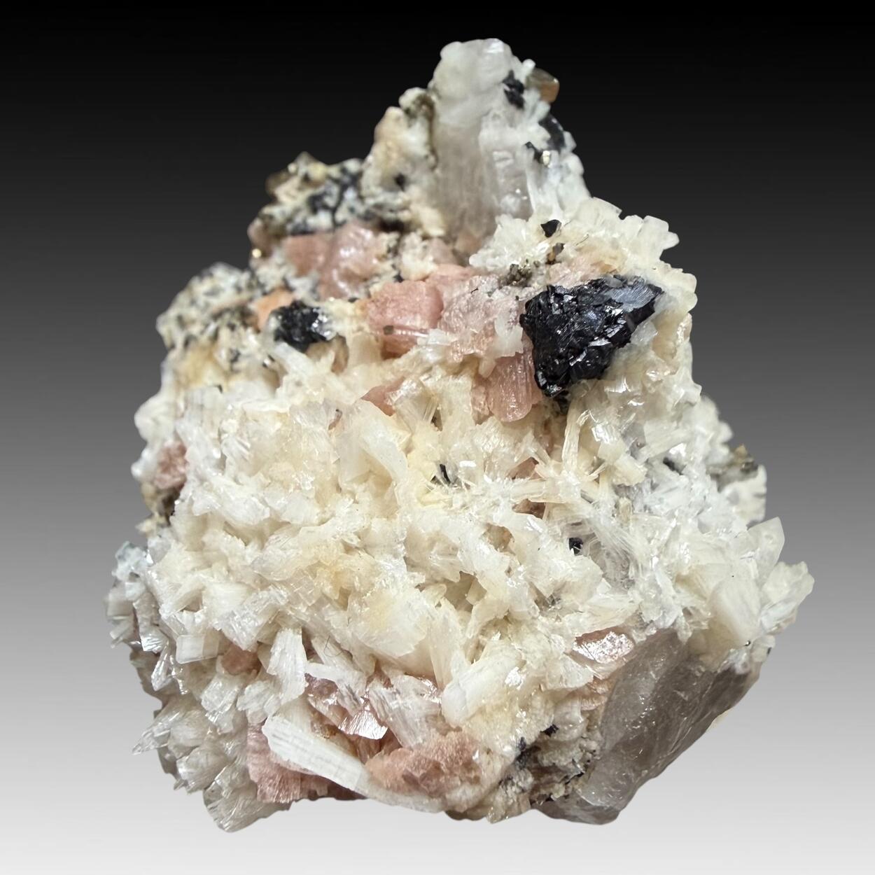 Bertrandite Rhodochrosite Wolframite & Pyrite