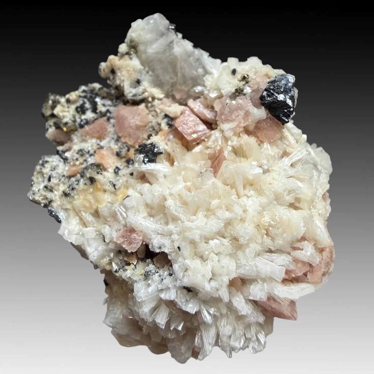 Bertrandite Rhodochrosite Wolframite & Pyrite