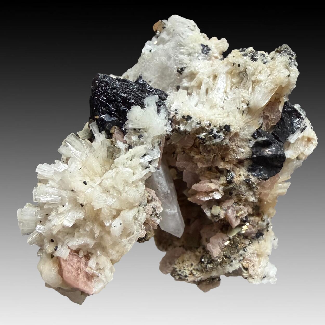 Bertrandite Rhodochrosite Wolframite & Pyrite