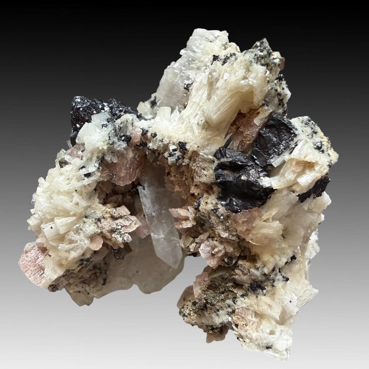Bertrandite Rhodochrosite Wolframite & Pyrite