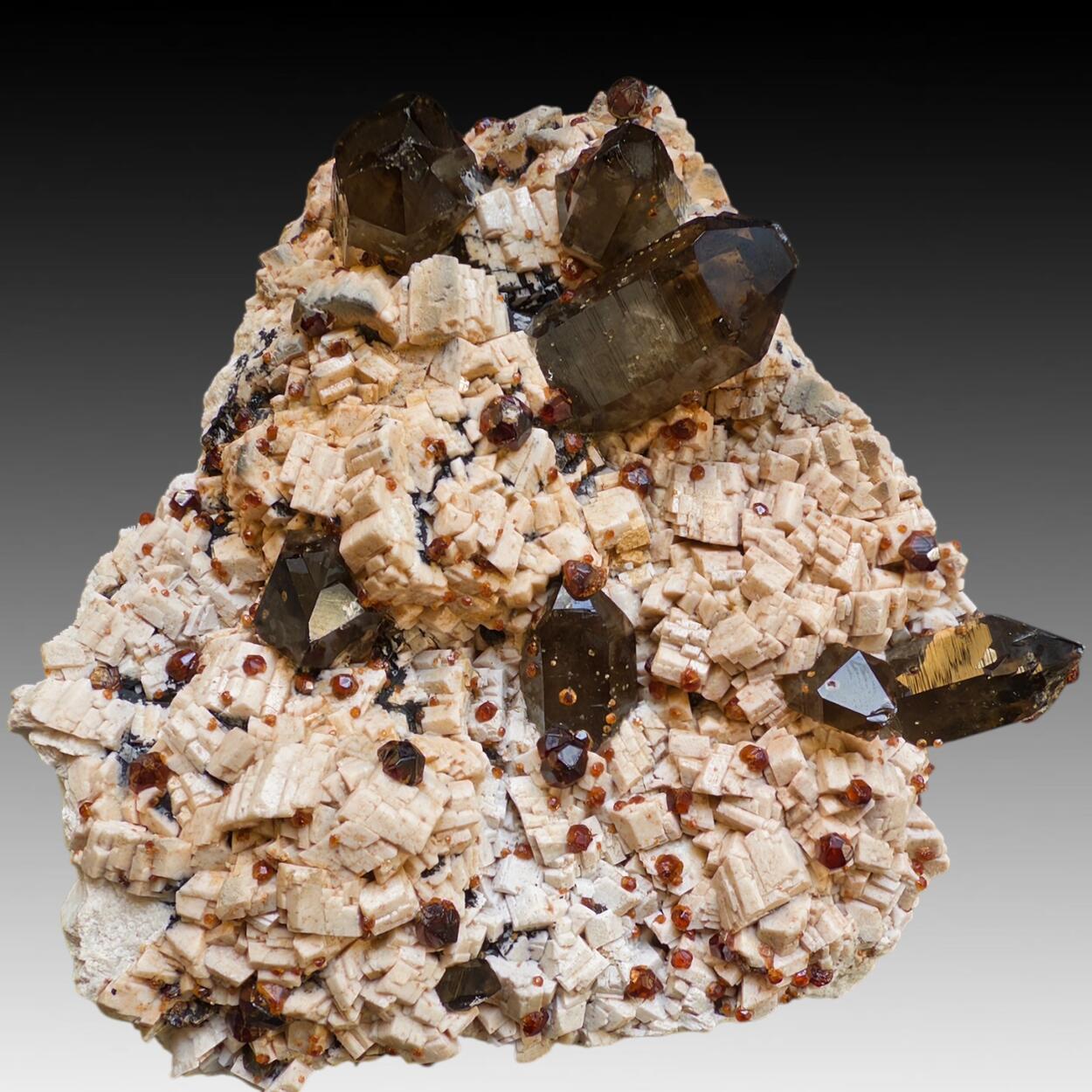 Smoky Quartz With Spessartine On Feldspar