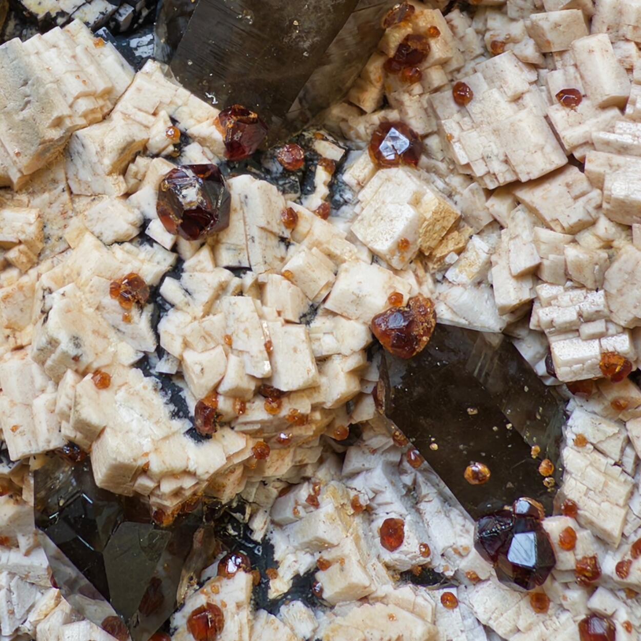 Smoky Quartz With Spessartine On Feldspar