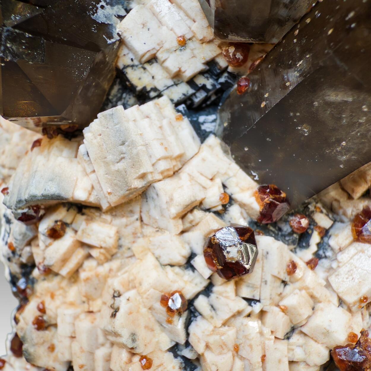 Smoky Quartz With Spessartine On Feldspar