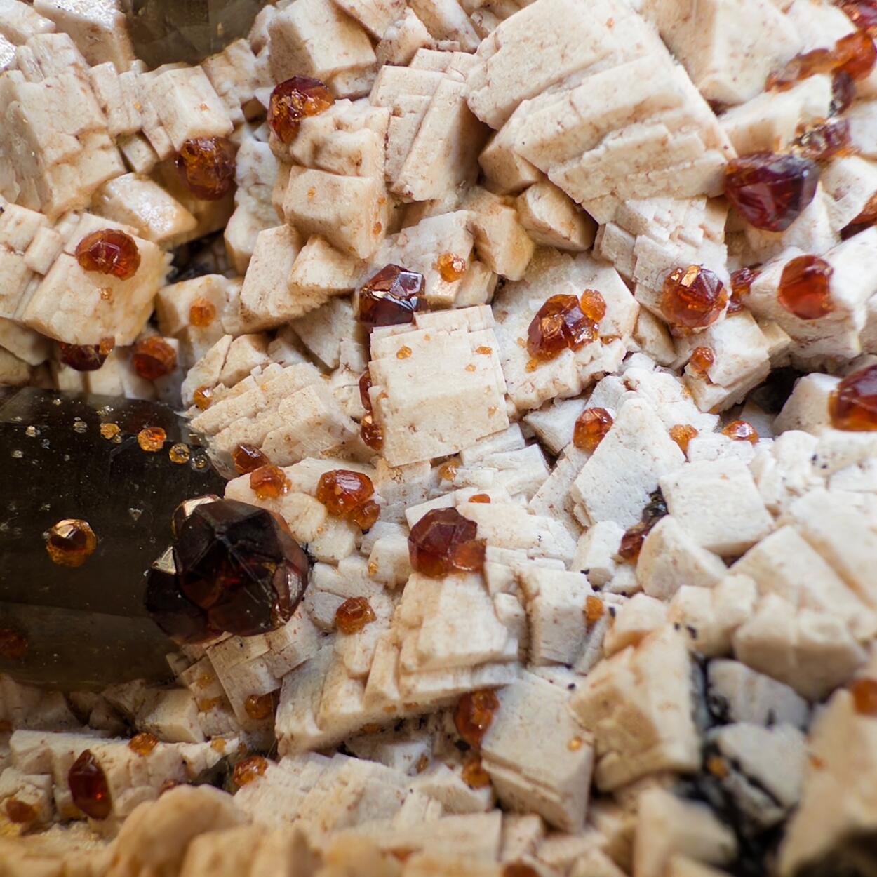 Smoky Quartz With Spessartine On Feldspar