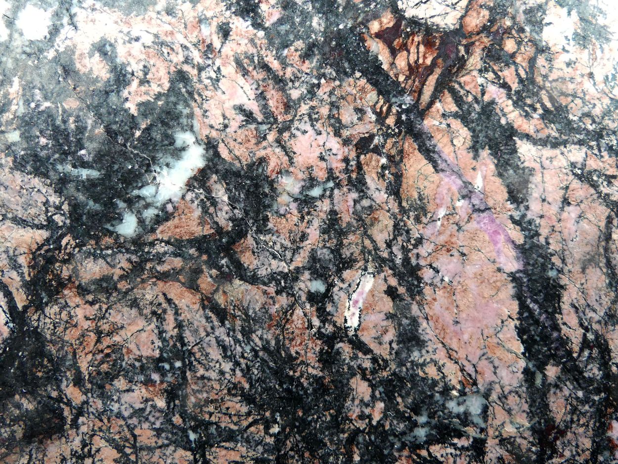Rhodonite Tinzenite Braunite & Manganoan Calcite