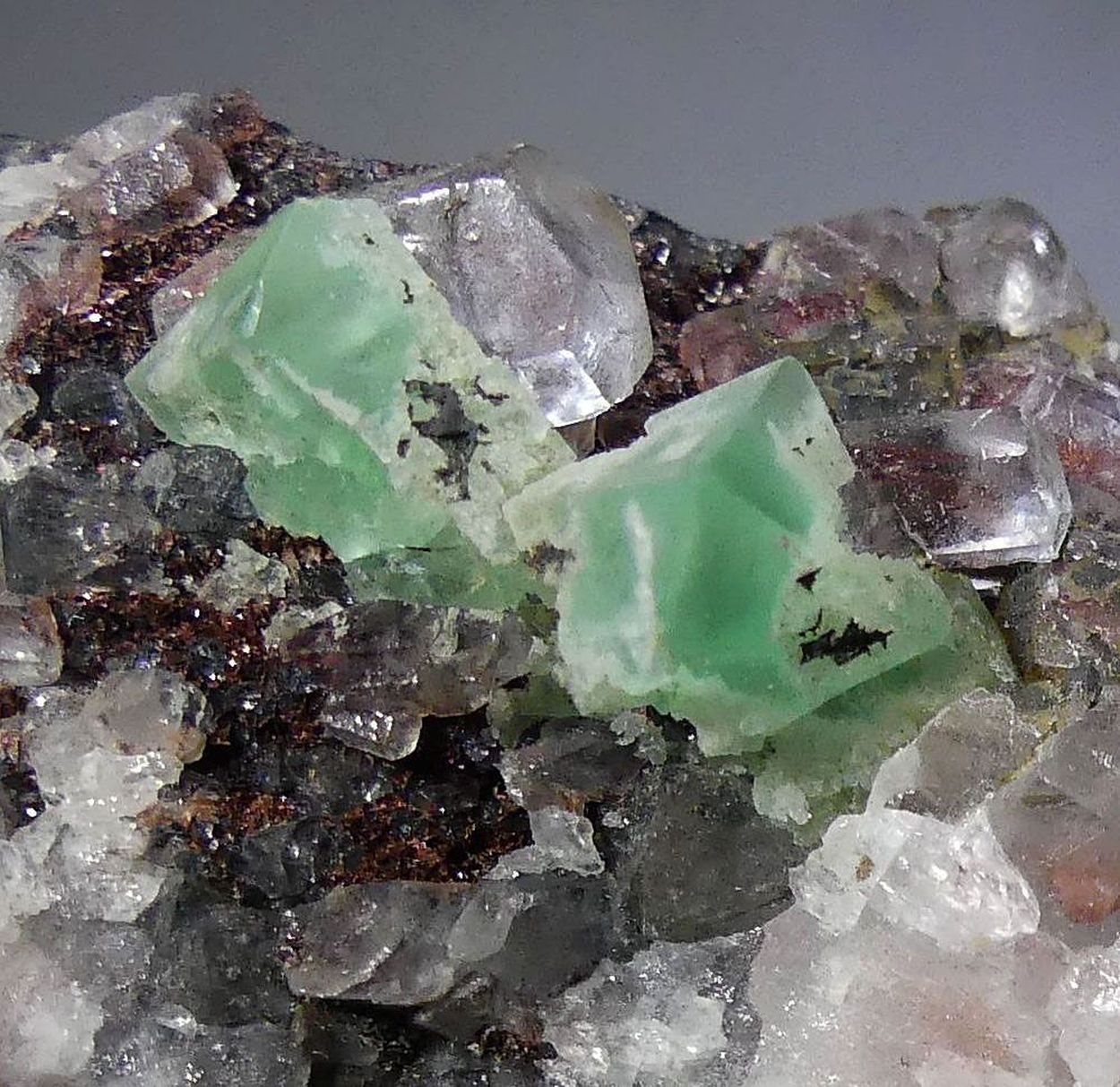 Fluorite & Lepidocrocite With Calcite