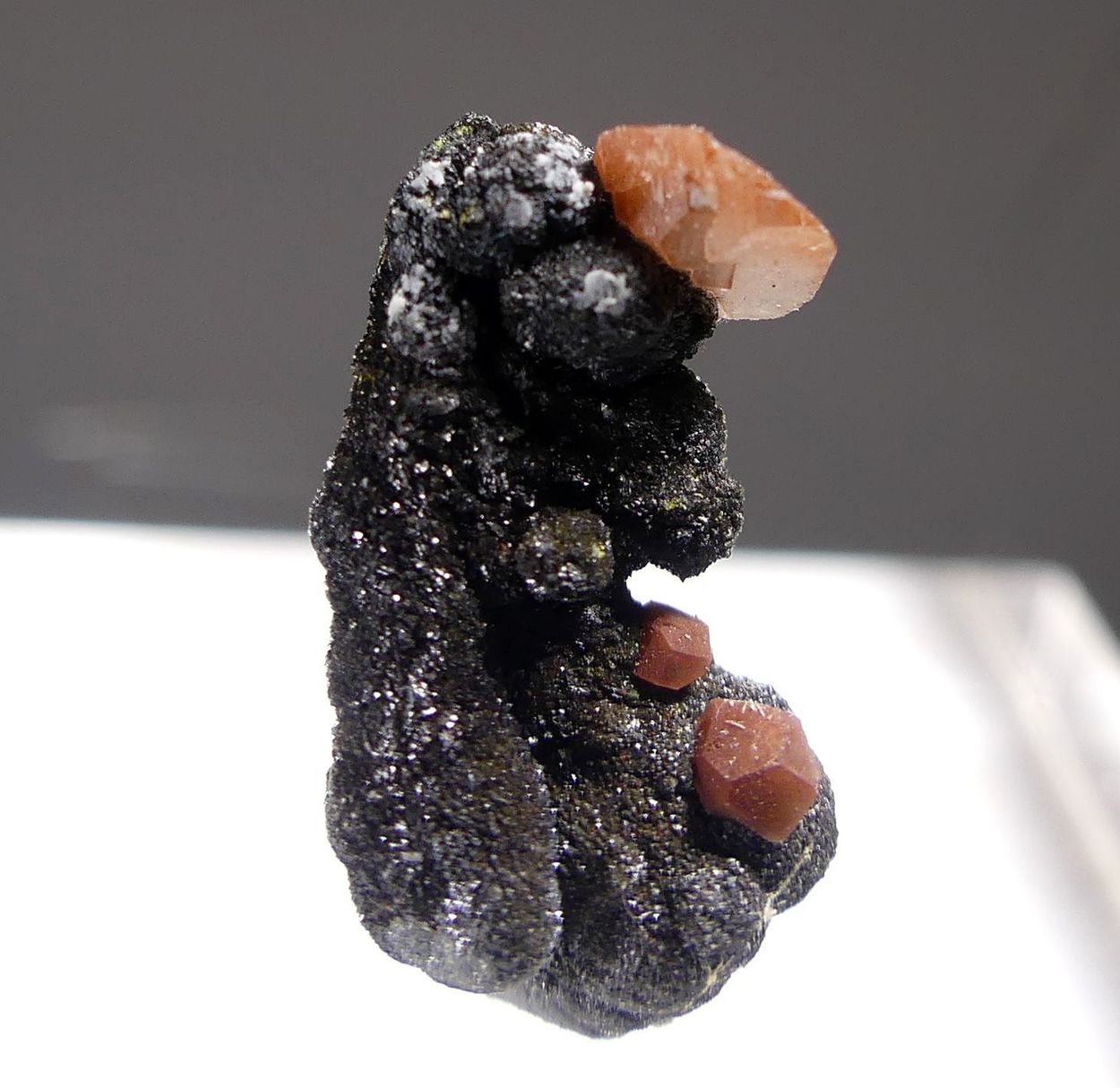 Calcite With Hematite Inclusions On Mottramite