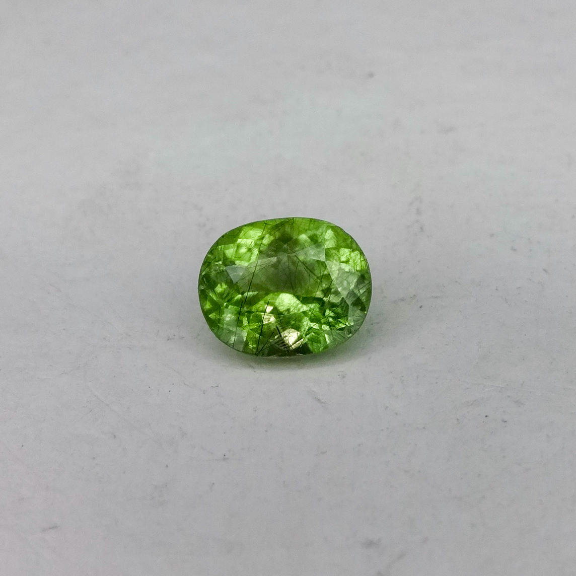 Peridot With Ludwigite Inclusions