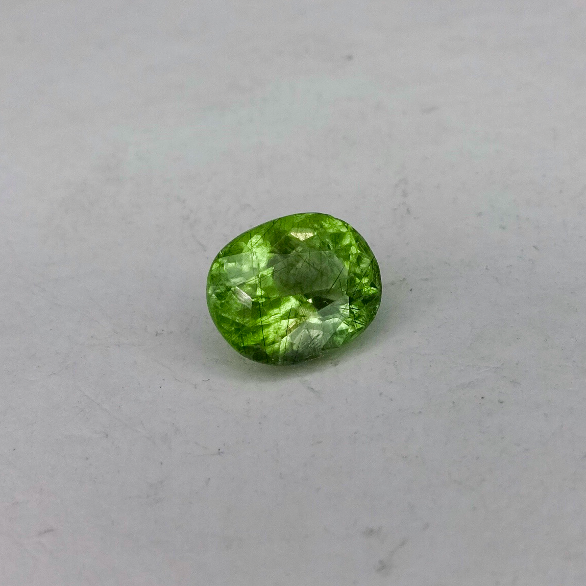 Peridot With Ludwigite Inclusions