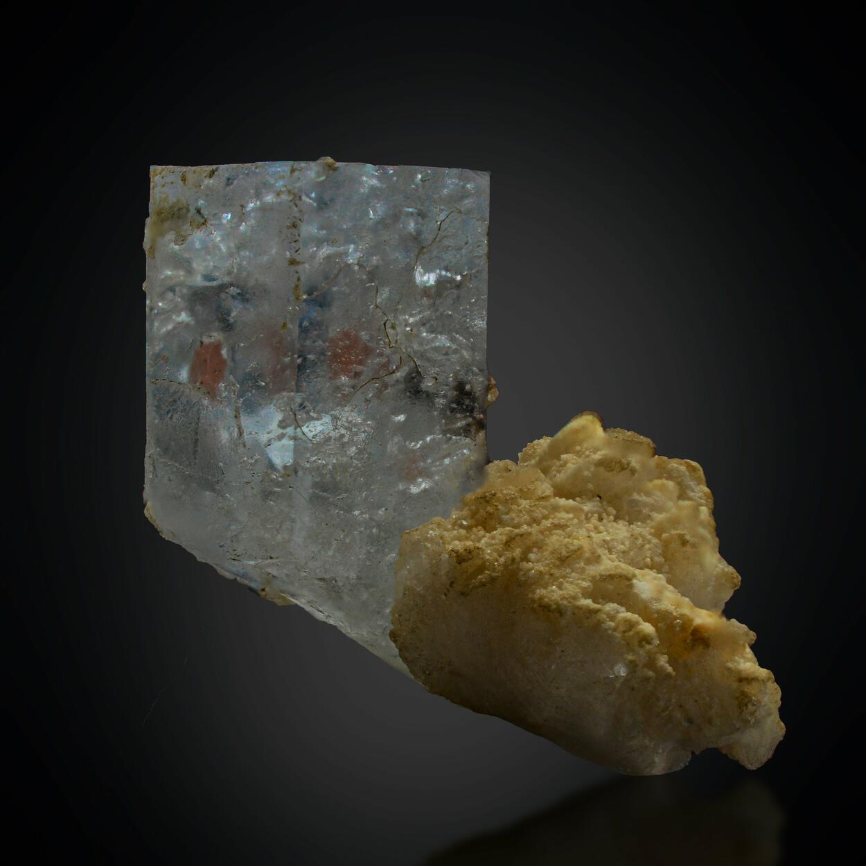 Aquamarine With Garnet Inclusions