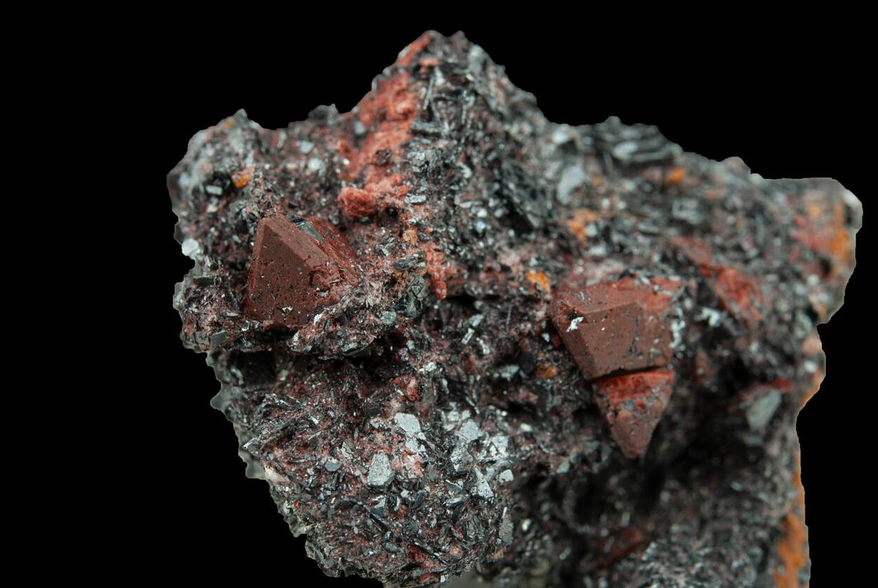 Zunyite On Hematite