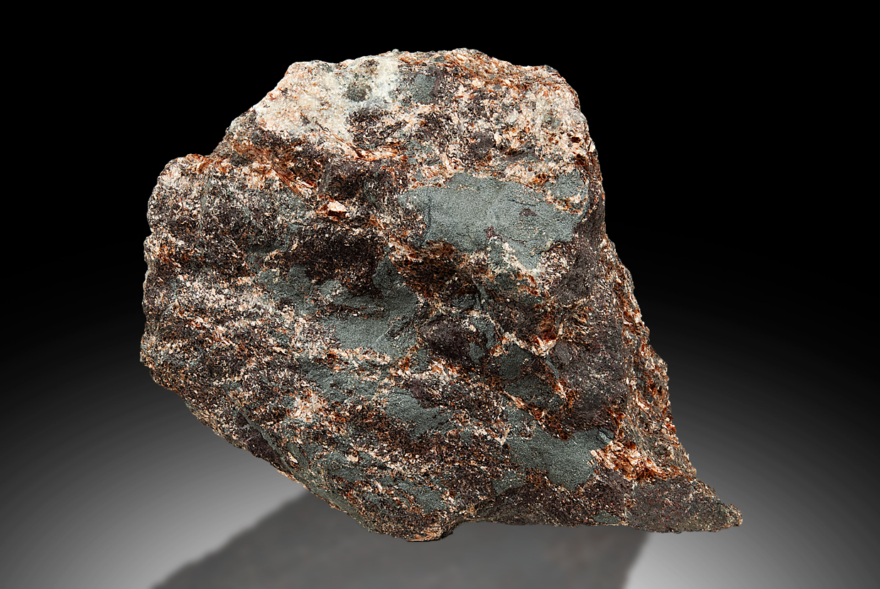 Muscovite Var Alurgite With Braunite