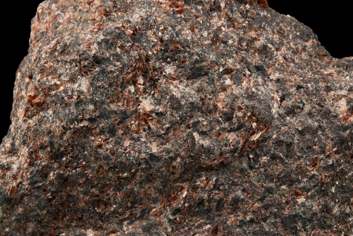 Muscovite Var Alurgite With Braunite