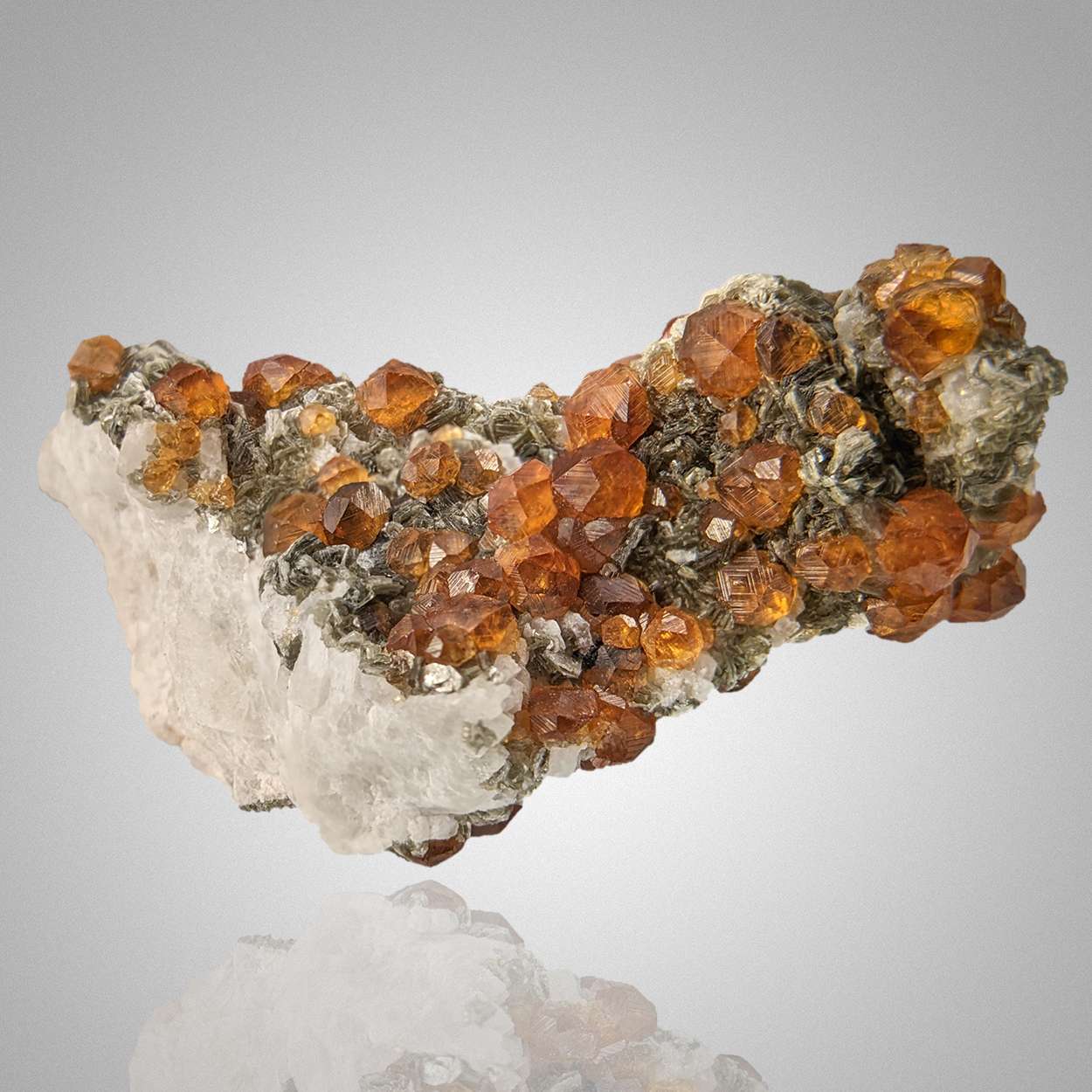 Spessartine & Muscovite