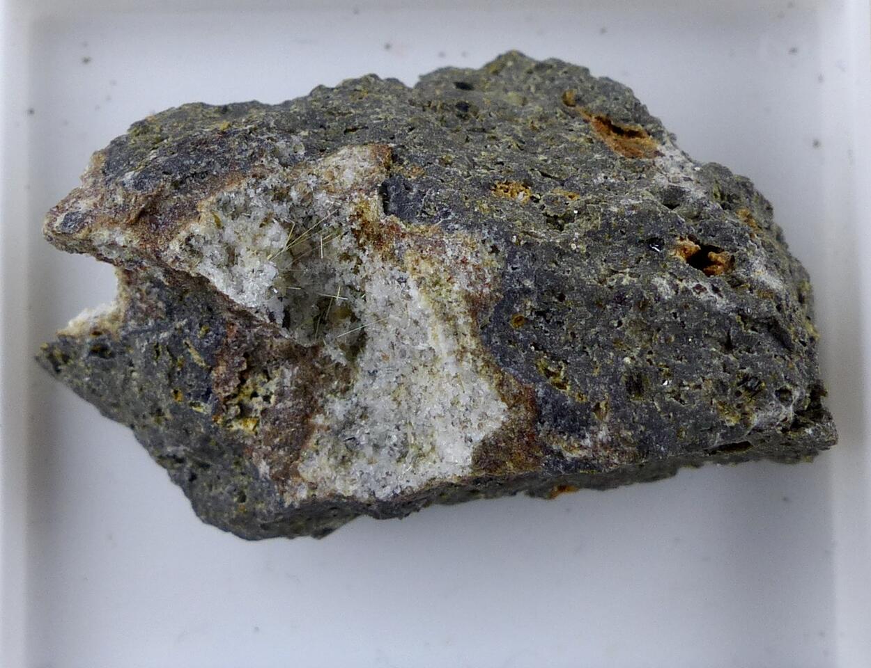 Titanite & Sanidine & Pseudobrookite & Hematite