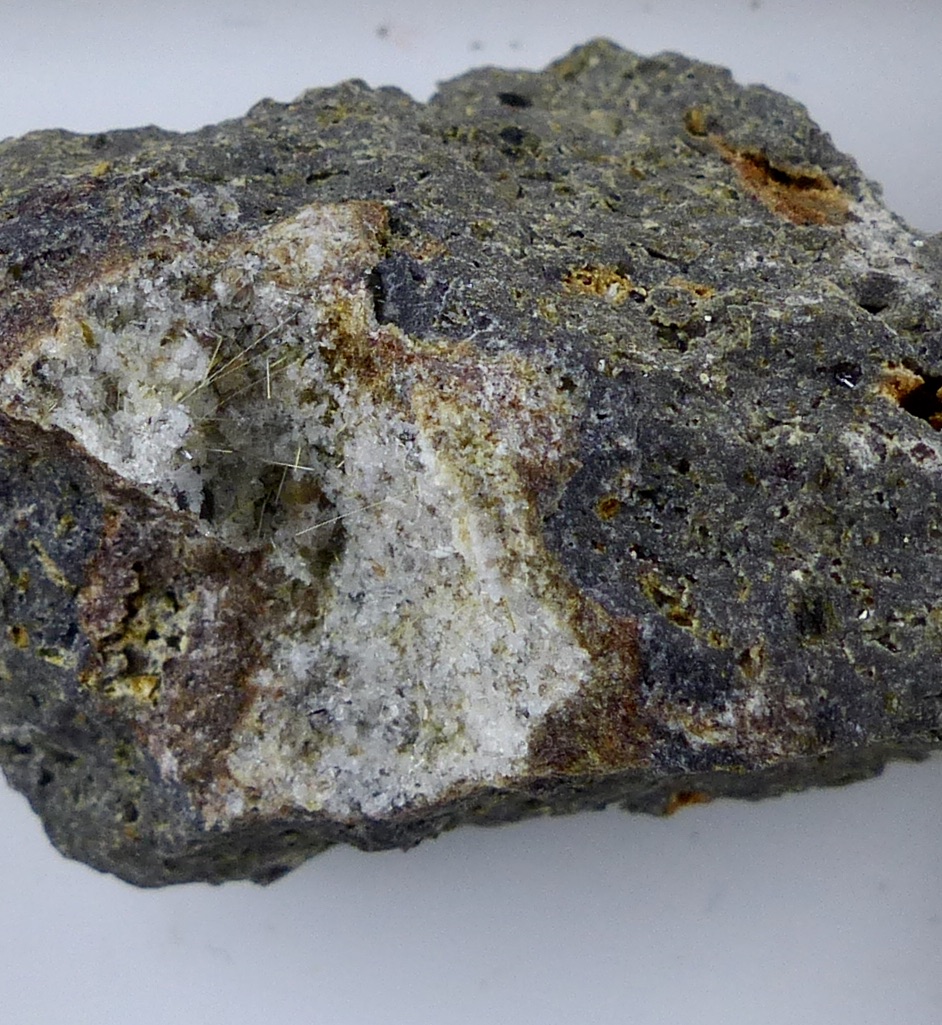 Titanite & Sanidine & Pseudobrookite & Hematite