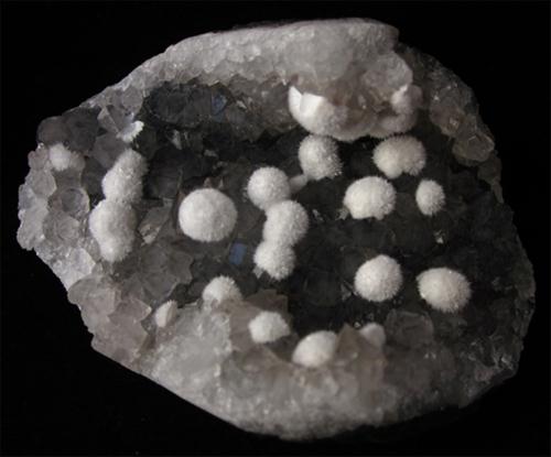 Okenite On Quartz