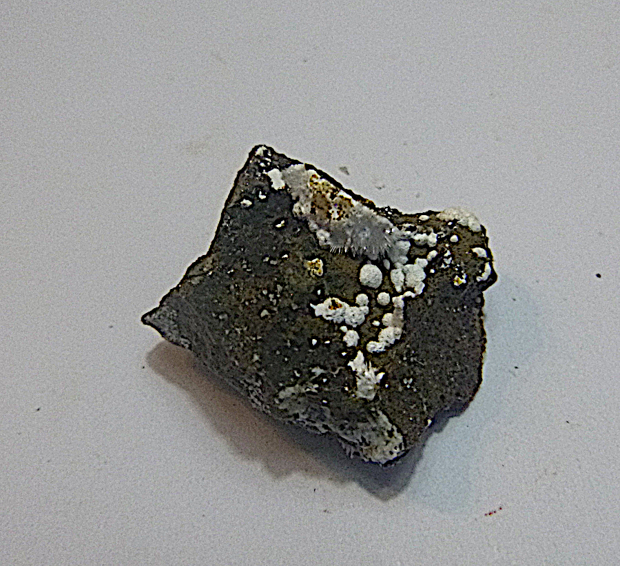 Tacharanite