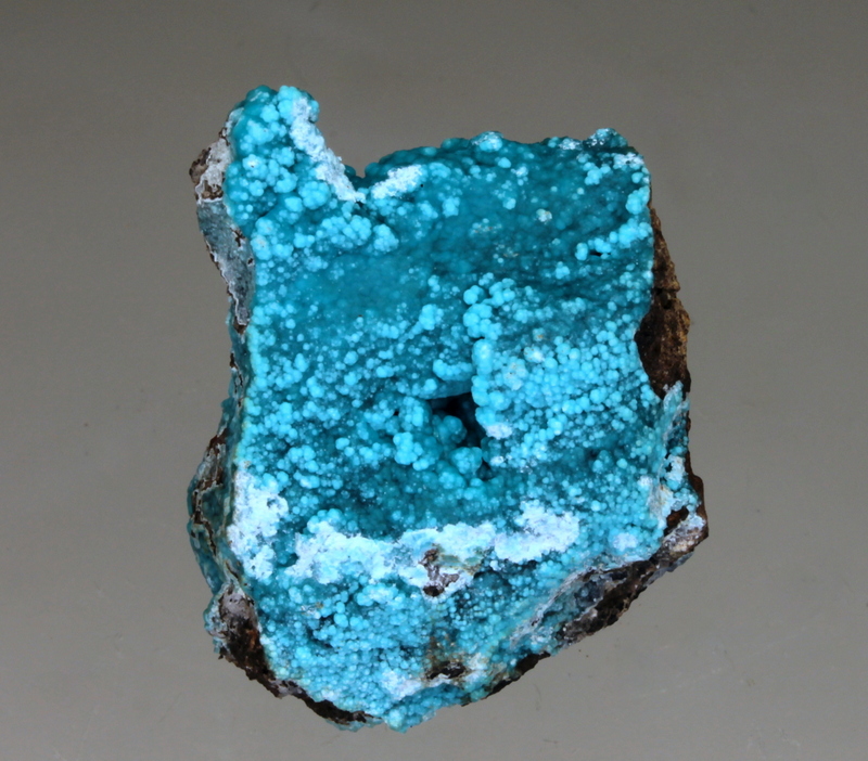 Glaucocerinite