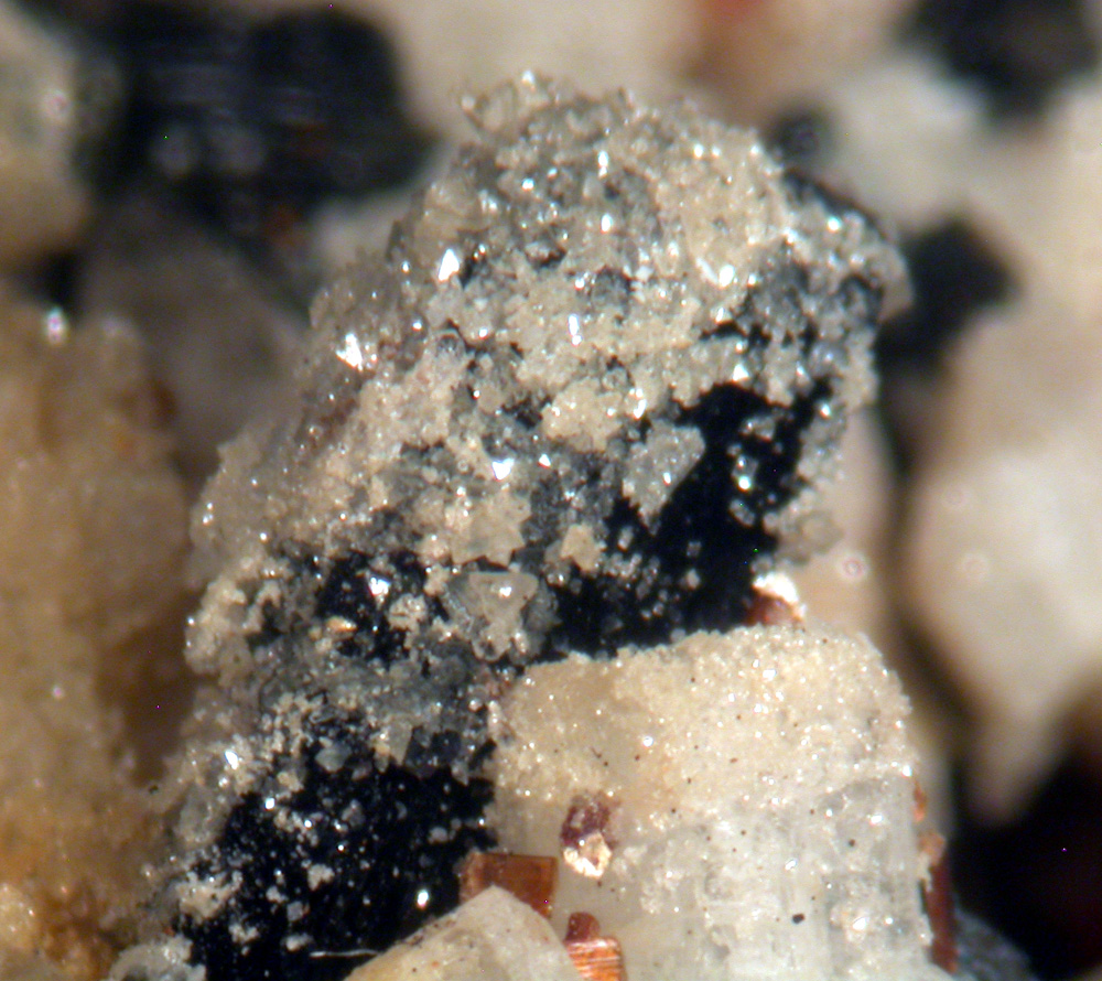 Ferro-katophorite Astrophyllite Fluornatropyrochlore & Zircon