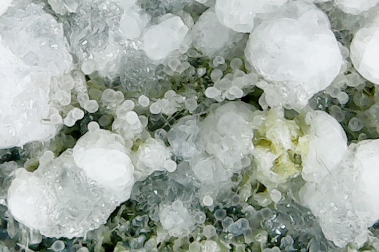 Phillipsite-K Chabazite-K Thomsonite & Calcite