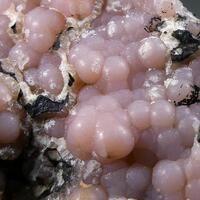 Rhodochrosite On Braunite