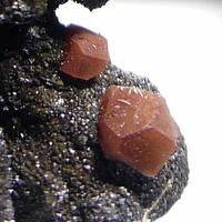 Calcite With Hematite Inclusions On Mottramite