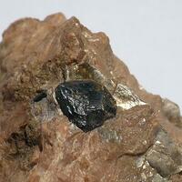 Tapiolite-(Fe)