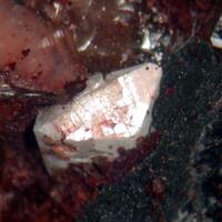 Hingganite-(Y) & Chlorite