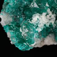 Calcite On Dioptase In Quartz