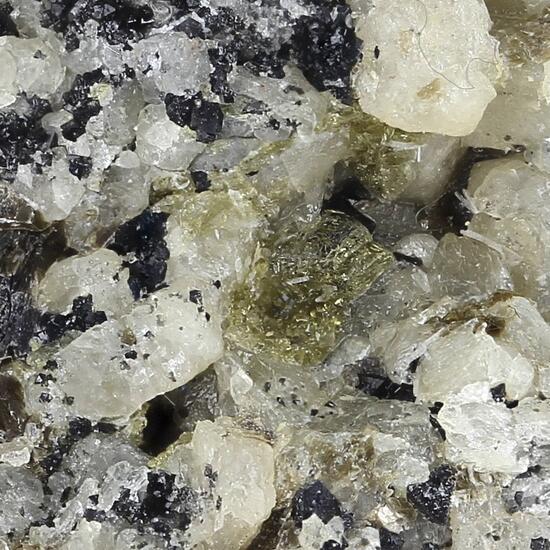 Forsterite With Sodalite & Pleonaste