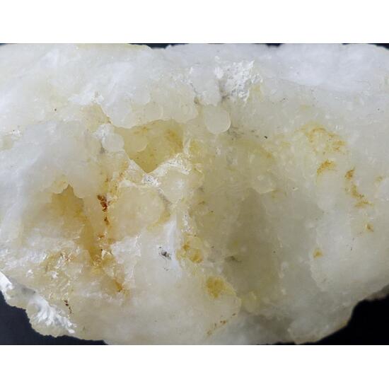 Thomsenolite