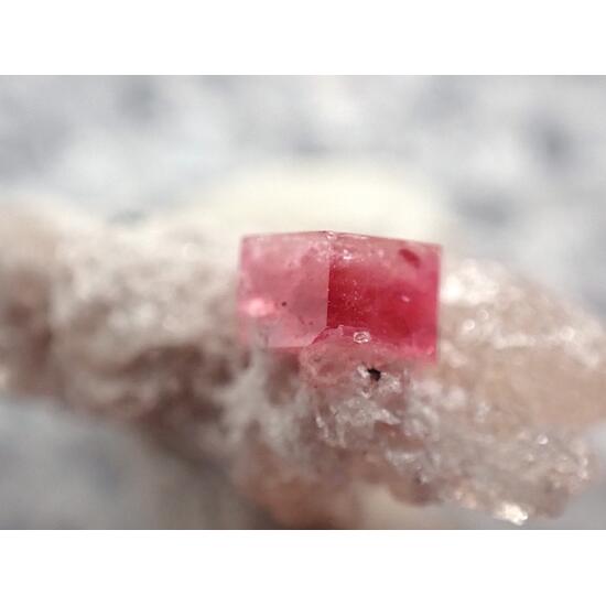 Red Beryl On Topaz