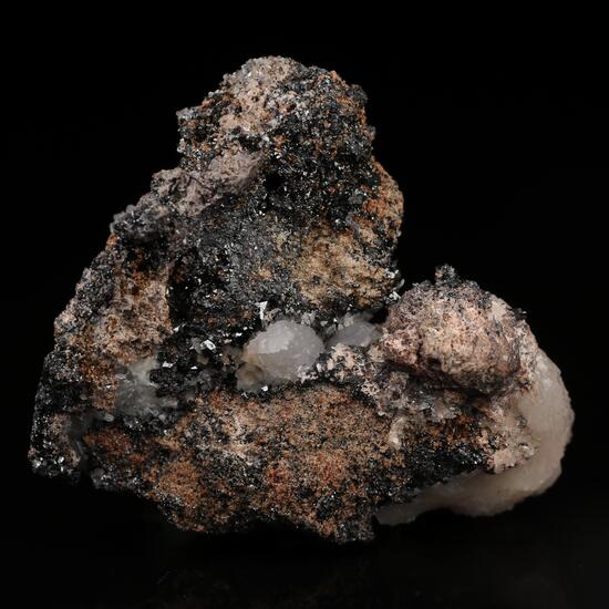 Manganoan Calcite On Hausmannite
