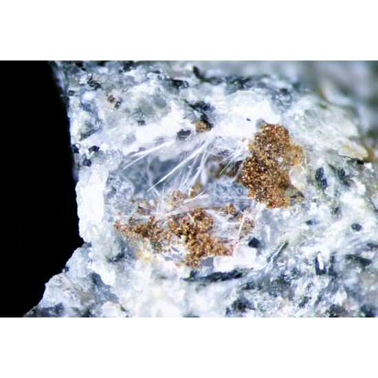 Vinogradovite Unnamed (Fe-analogue of Zakharovite)